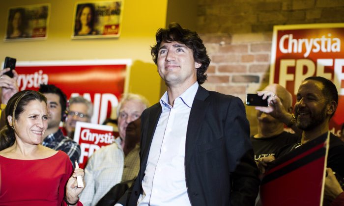 Liberal Leader Justin Trudeau attends a campaign rally for byelection candidate Chrystia Freeland (L) at her Toronto Centre campaign office on Wednesday Oct. 2, 2013. (The Canadian Press/Chris Young)