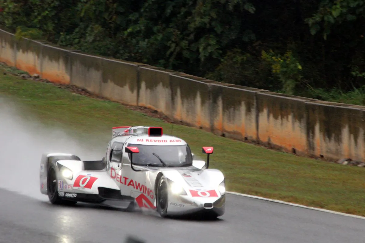 The DeltaWing LM12 coupe, with Katherine Legge at the wheel, bids “Au Revoir” to the ALMS while lapping Road Atlanta in the rain Thursday afternoon. (Chris Jasurek/Epoch Times)