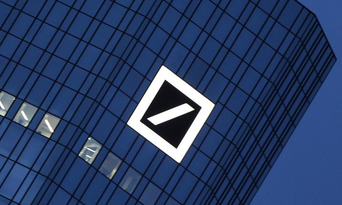 The logo of Deutsche Bank at the company's headquarters in Frankfurt, Germany, Dec. 8, 2011. Deutsche Bank is one of the banks warning about a drop in fixed income revenues.(Daniel Roland/AFP/Getty Images)