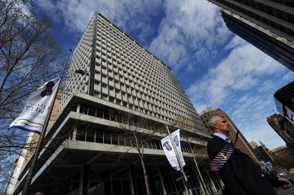 A man walks before the Reserve Bank of Australia in Sydney. The Reserve Bank of Australia has left the cash rate steady at 2.5 per cent. (Romeo Gacad/AFP/GettyImages)