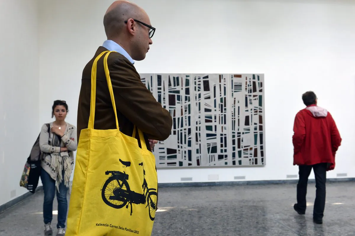 Visitors during the press preview of the 55th Venice art biennale on May 29, 2013 in Venice. (GABRIEL BOUYS/AFP/Getty Images)