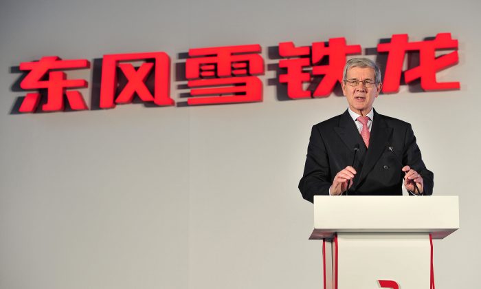 Philippe Varin, CEO of PSA Peugeot Citroën gives a speech at a new Dongfeng Peugeot-Citroën Automobile Limited (DPCA) plant in Wuhan, central China, July 2, 2013. (AFP/AFP/Getty Images)