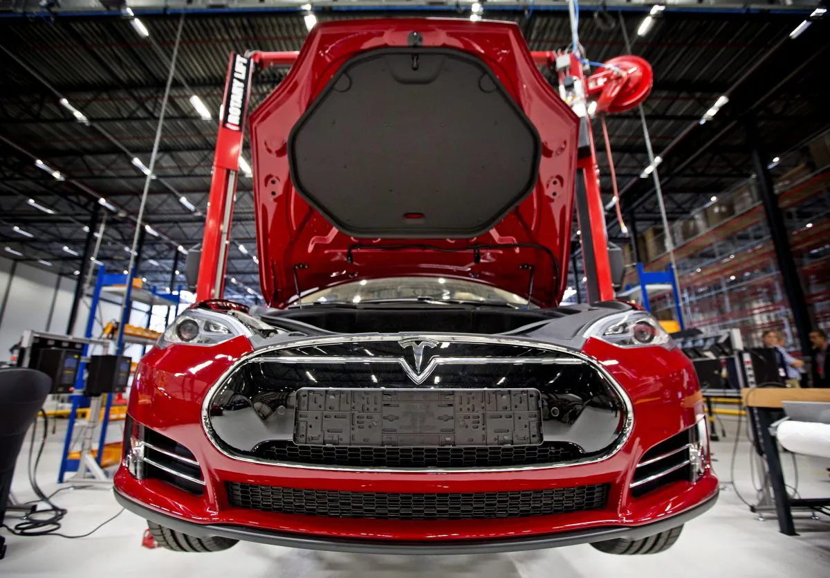 A Tesla electric car on an assembly line in the Netherlands, Aug. 22. (Guus Schoonewille/AFP/Getty Images)