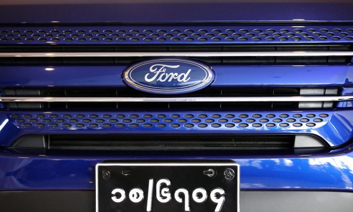 A Ford car carrying a Burma plate at a Ford showroom in Yangon, Burma, Oct. 4. (Ye Aung Thu/AFP/Getty Images)