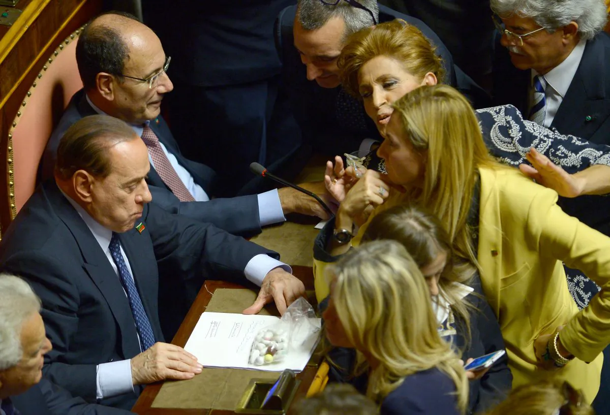 Silvio Berlusconi (front, L) and senators from his People of Freedom Party at the Senate in Rome, Italy, Oct. 2, 2013. (Filippo Monteforte/AFP/Getty Images)