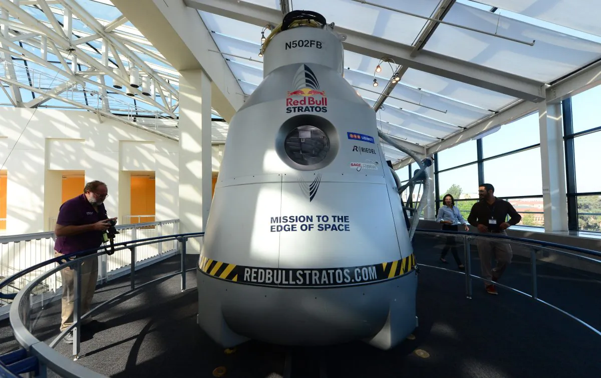 The Red Bull Stratosspace capsule that carried pilot Felix Baumgartner to space is placed on exhibit at the California Science Center on Oct. 11 in California. A new video of Baumgartner’s 24-mile jump was recently released by Red Bull. (FREDERIC J. BROWN/AFP/Getty Images)