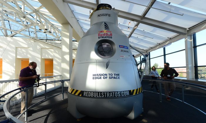 The Red Bull Stratosspace capsule that carried pilot Felix Baumgartner to space is placed on exhibit at the California Science Center on Oct. 11 in California. A new video of Baumgartner’s 24-mile jump was recently released by Red Bull. (FREDERIC J. BROWN/AFP/Getty Images)