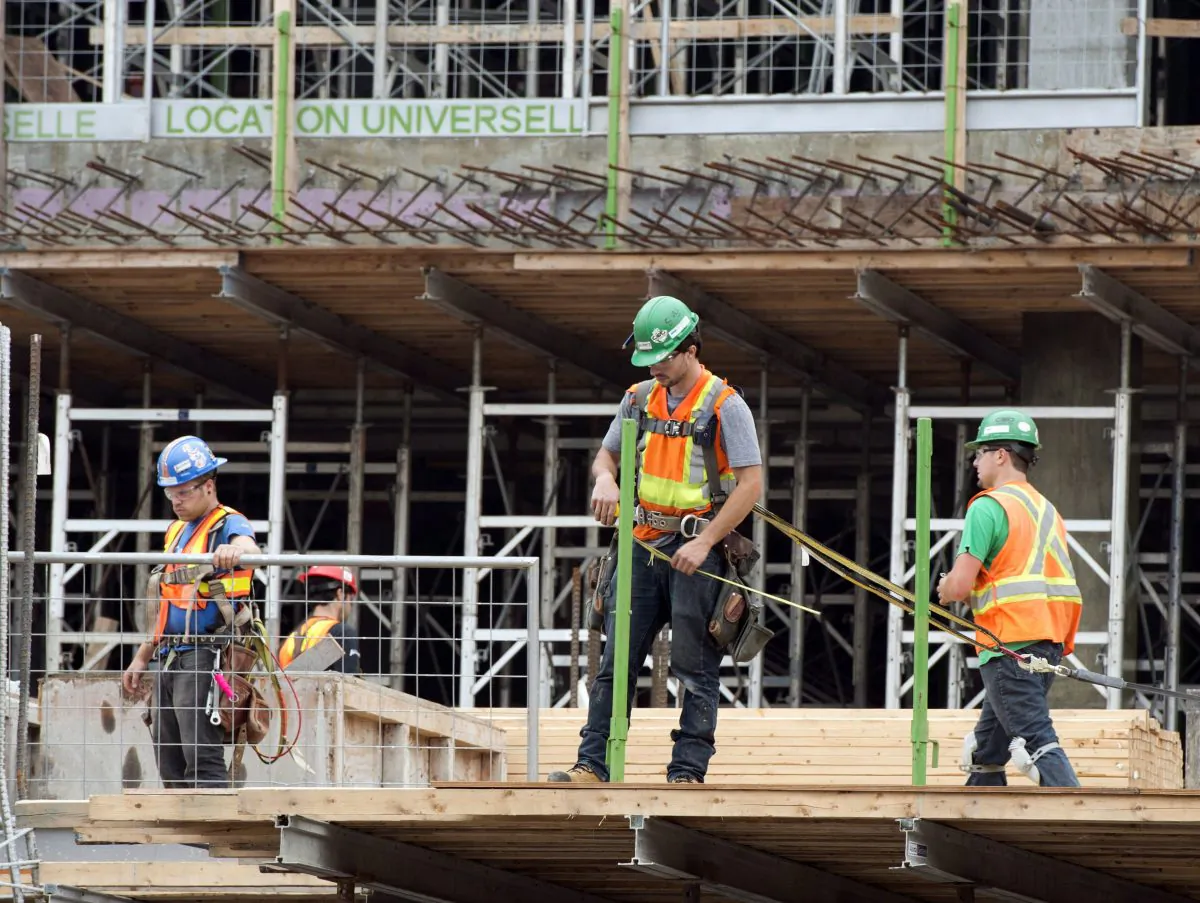 Construction workers at a site in Montreal in a file photo. (The Canadian Press/Ryan Remiorz)