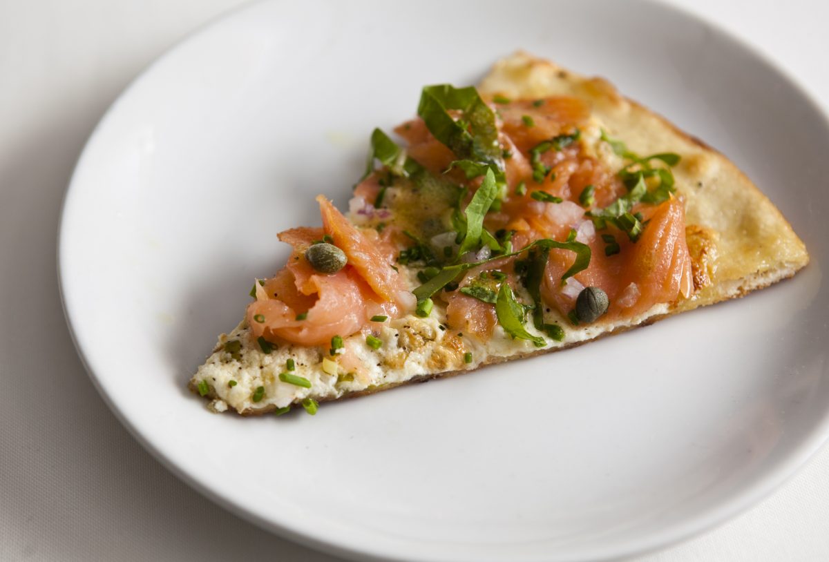 Smoked salmon pizza, with lemon ricotta, and capers at Incognito Bistro in New York City. (Samira Bouaou/Epoch Times)