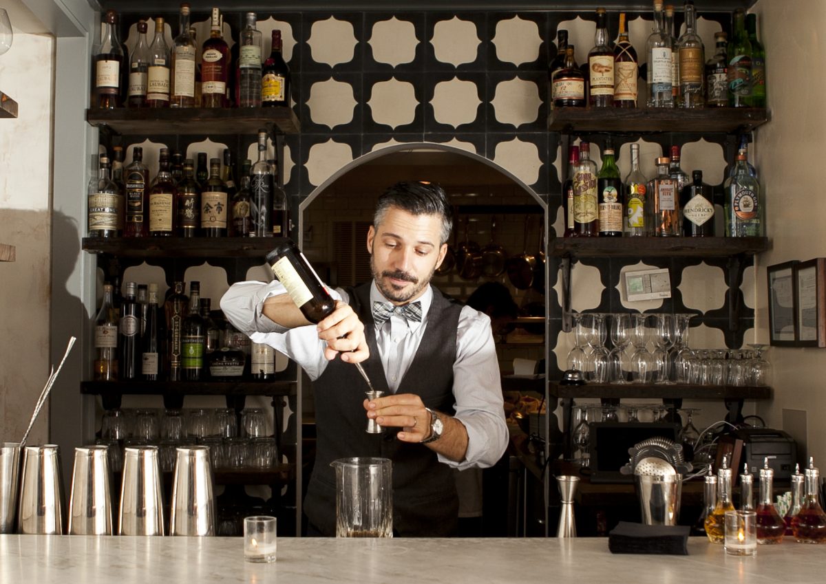 Xavier Herit making cocktails at his new bar, Wallflower, which opened in the West Village on Oct. 22. (Samira Bouaou/Epoch Times)