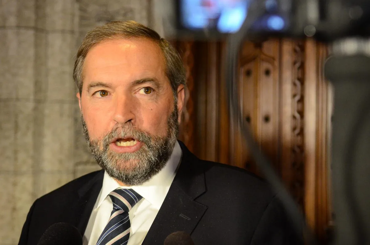NDP leader Thomas Mulcair told reporters Wednesday that the Conservative government is offering an imitation of many NDP policies among the priorities laid out in the throne speech. (Matthew Little/Epoch Times)