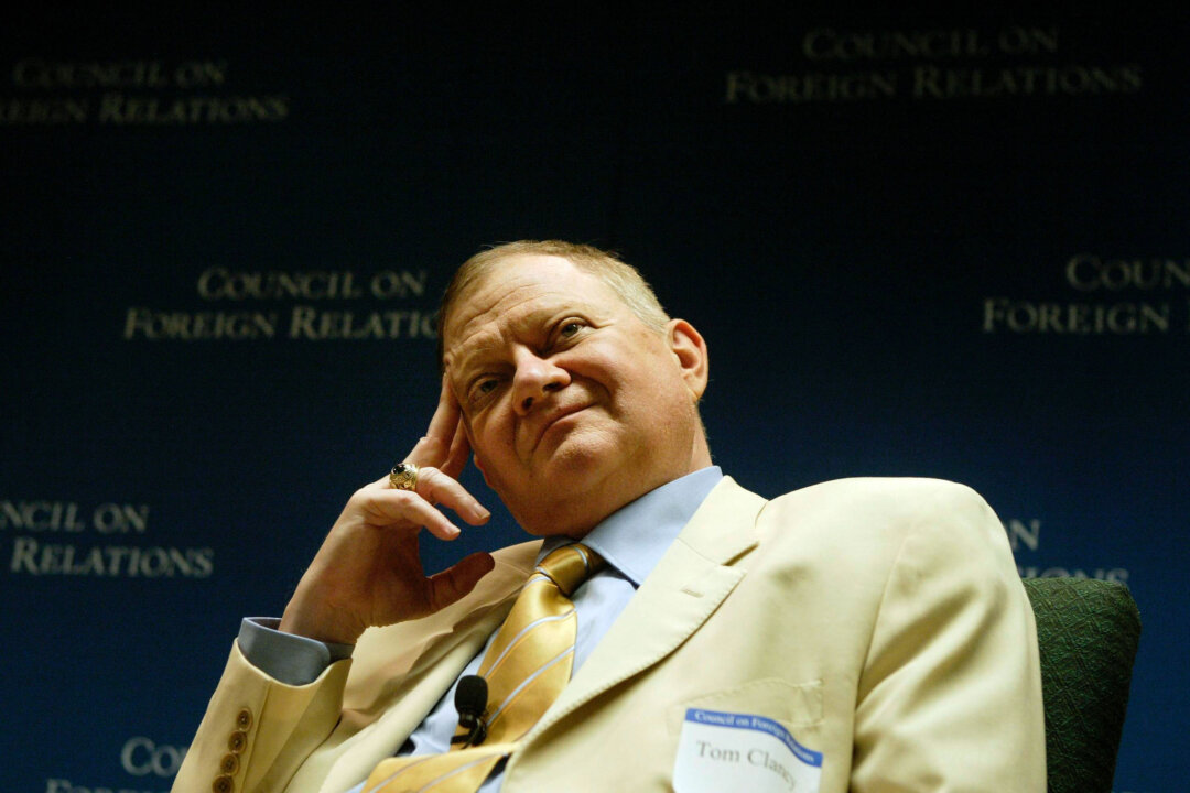Tom Clancy listens to questions during a discussion June 1, 2004 in Washington, DC. (Brendan Smialowski/Getty Images)