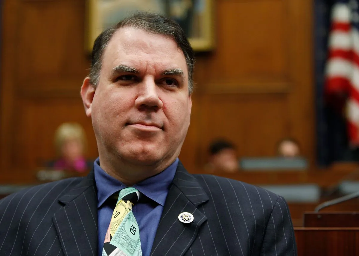 Rep. Alan Grayson (D-Fla.) listens to Federal Reserve Board Chairman Ben Bernanke testify during a House Financial Services Committee hearing on Capitol Hill in Washington on Oct. 1, 2009. (Photo by Mark Wilson/Getty Images)