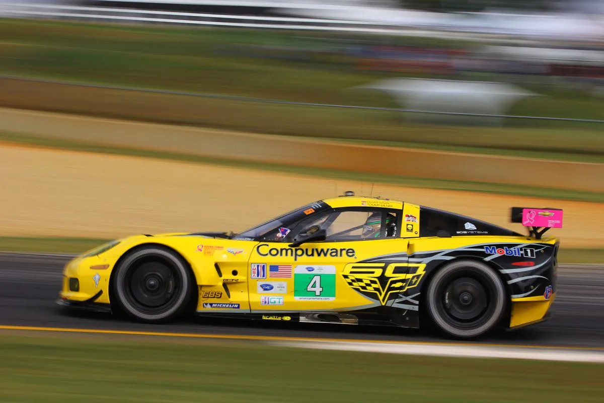 The #4 Corvette of Tom Milner and Olly Gavin steams out of Turn 10a headed to 10b during the afternoon session. (Chris Jasurek/Epoch Times)