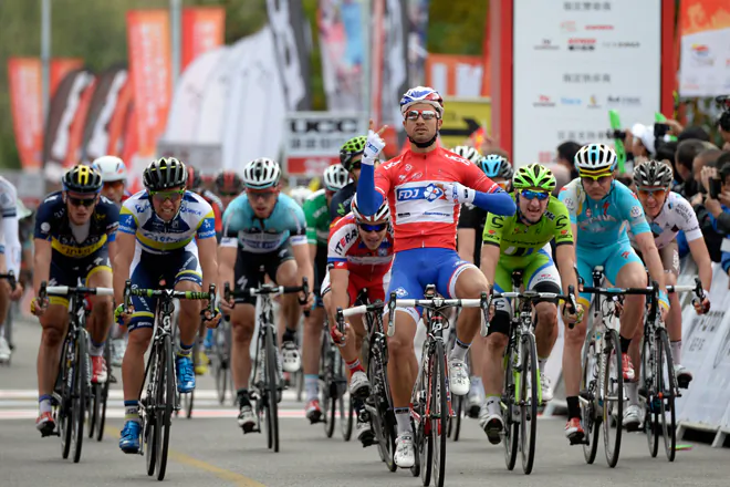 FDJ’s Nacer Bouhanni raises two fingers to celebrate his second stage win, after outsprinting his rivals in Stage Three of the Tour of Beijing. (tourofbeijing.net)