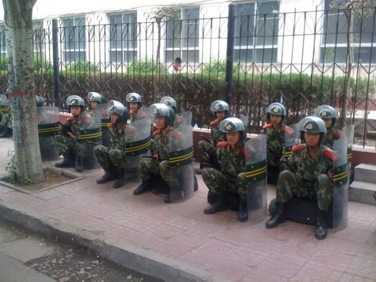Riot police are on alert on the streets of Hohhot, Inner Mongolia in 2011. Chinese security forces have recently begun a disarmament and mobilization campaign in the province. (Southern Mongolian Human Rights Information Center)