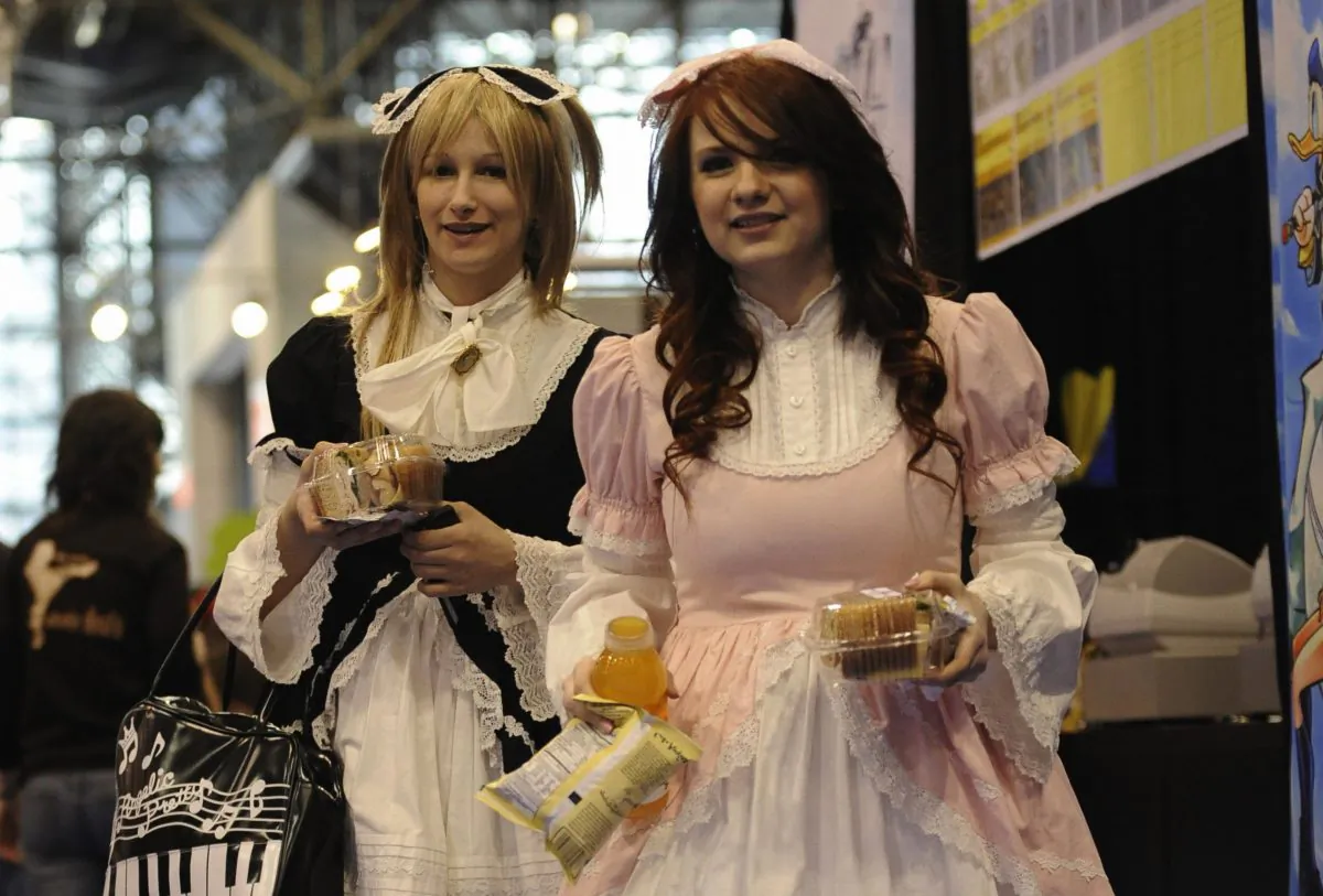 Two CosPlay ladies attend New York ComicCon 2009, the city's main comic books fair, Feb. 6, 2009. The 2013 event runs Oct 10-13, and offers access to fans to the top names in comic books, television, gaming and film, catering to the sci-fi, horror and fantasy crowd, with hundreds of exhibitors and dozens of world-known artists attending. (Emmanuel Dunand/AFP/Getty Images)