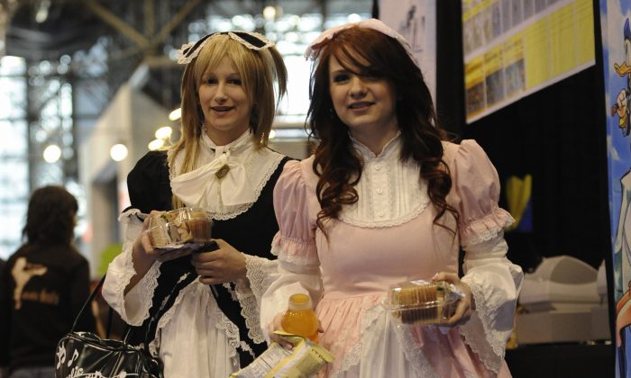 Two CosPlay ladies attend New York ComicCon 2009, the city's main comic books fair, Feb. 6, 2009. The 2013 event runs Oct 10-13, and offers access to fans to the top names in comic books, television, gaming and film, catering to the sci-fi, horror and fantasy crowd, with hundreds of exhibitors and dozens of world-known artists attending. (Emmanuel Dunand/AFP/Getty Images)