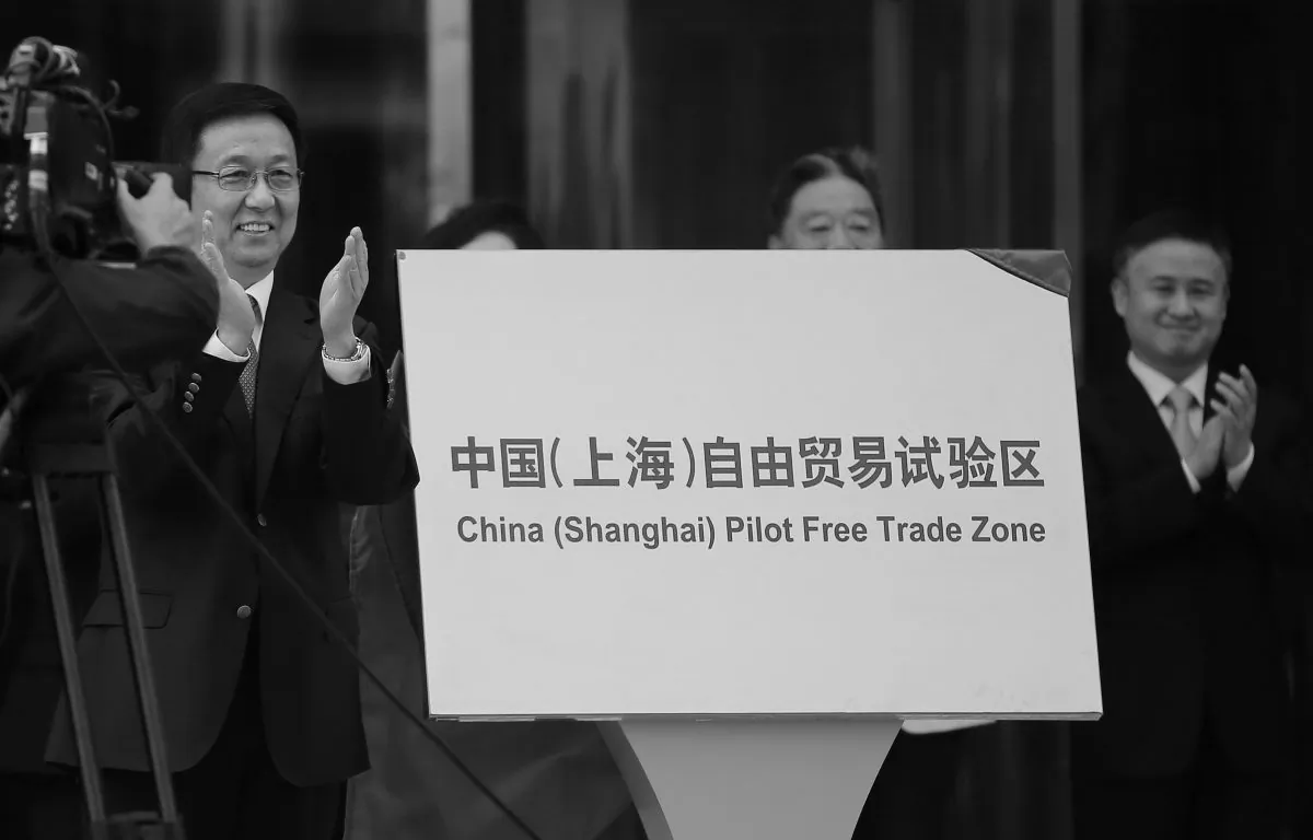 Shanghai Municipality Communist Party Secretary Han Zheng inaugurates the Shanghai Free Trade Zone during a ceremony in the Pudong district of Shanghai on Sept. 29, 2013. Qing Lang argues that the Chinese regime can never allow free trade to succeed. (Carlos Barria/AFP/Getty Images)