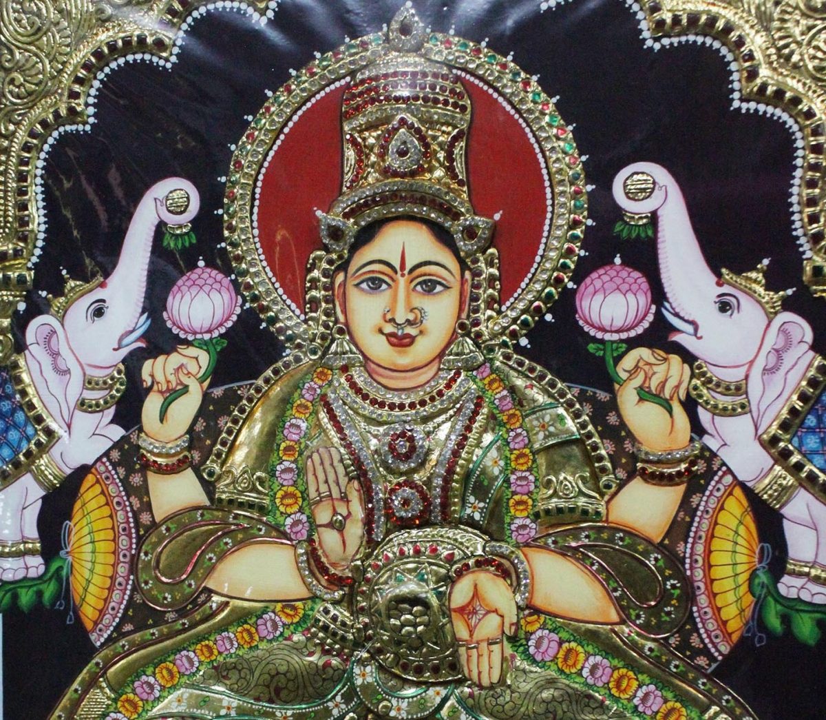 Hindu goddess done in Tanjore painting style by V. Panneer Selvam. This traditional painting style generally portrays Hindu gods, saints, and stories from mythology. (Venus Upadhayaya/Epoch Times)