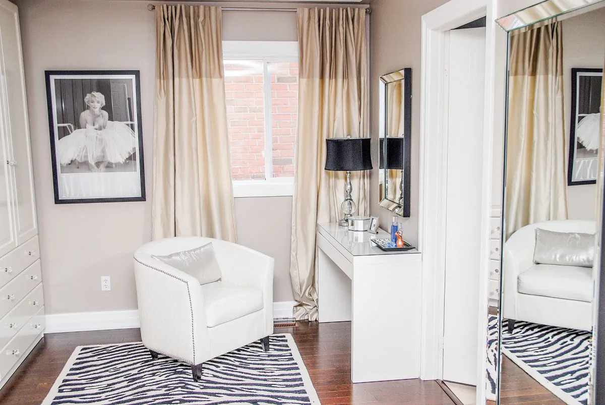 Turn a small unused bedroom—or a walk-in closet—into a stylish dressing room. (Courtesy of Nella Casa Bella)
