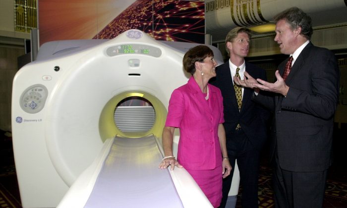 A patient has to be given radioactive material before undergoing a PET scan. After the scan, patients are radioactive for a period of time and should avoid close contact with others. (Henny Ray Abrams/AFP/Getty Image) 