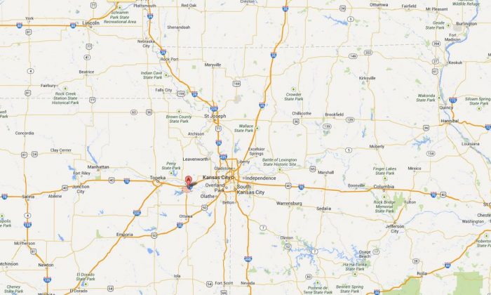 A screenshot of Google News shows Lawrence, Kansas.