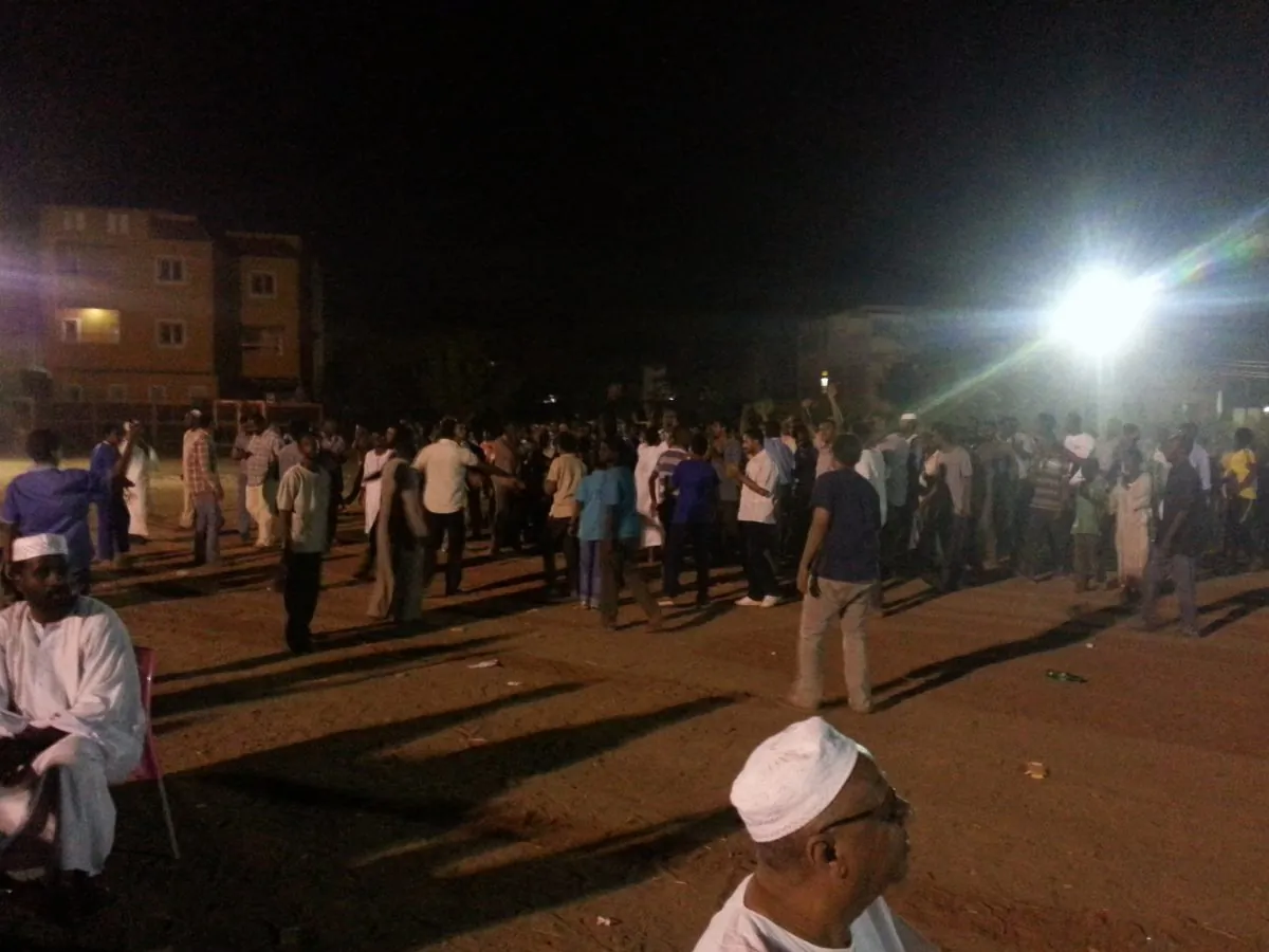 Sudanese taking part in a protest on Sept. 30, 2013, in the streets of Khartoum's Burri area for a third day to express support for Salah Sanhouri, who was shot dead a few days before during a protest. (AFP/Getty Images) 