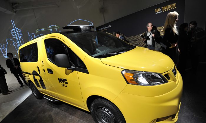 The Nissan NV200, New York's Taxi of Tomorrow, is unveiled on the New York International Automobile Show in New York, April 3, 2012. (Stan Honfa/AFP/Getty Images)