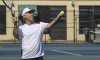 A senior practices his serve during a free tennis course offered by the Parks Foundation. (Mary Peters/Parks Foundation)