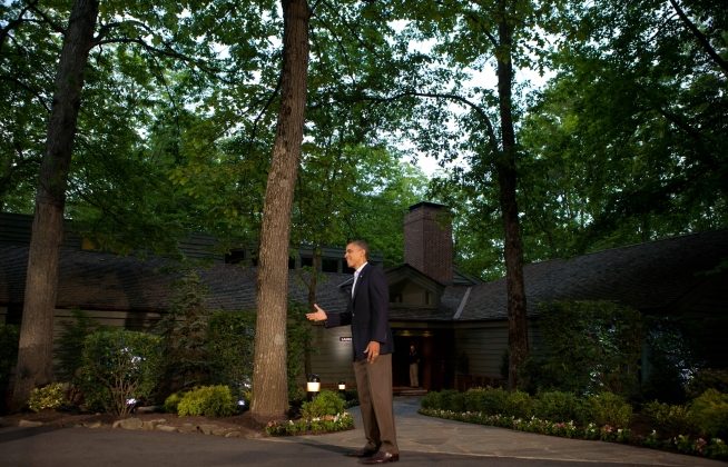 At Camp David, President Barack Obama welcomes G8 Summit leaders outside of Laurel Cabin, May 18, 2012.  Vice President Joe Biden and his family took a vacation at the camp from Oct. 13 through Oct. 15, 2013. (White House/Chuck Kennedy)