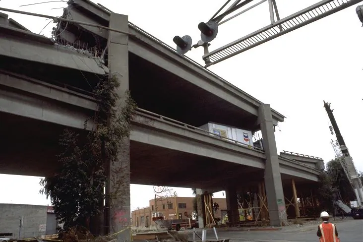 Ground movement during the Loma Prieta Earthquake in California pancaked the upper deck of the Cypress Street Viaduct so that the upper deck dropped to the lower deck. (USGS)