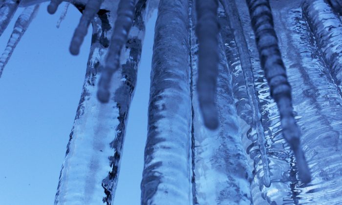 Icicles hang from a roof on Jan. 11, 2012 at Fernpass mountain pass near Reutte, Austria. (Johannes Simon/Getty Images)