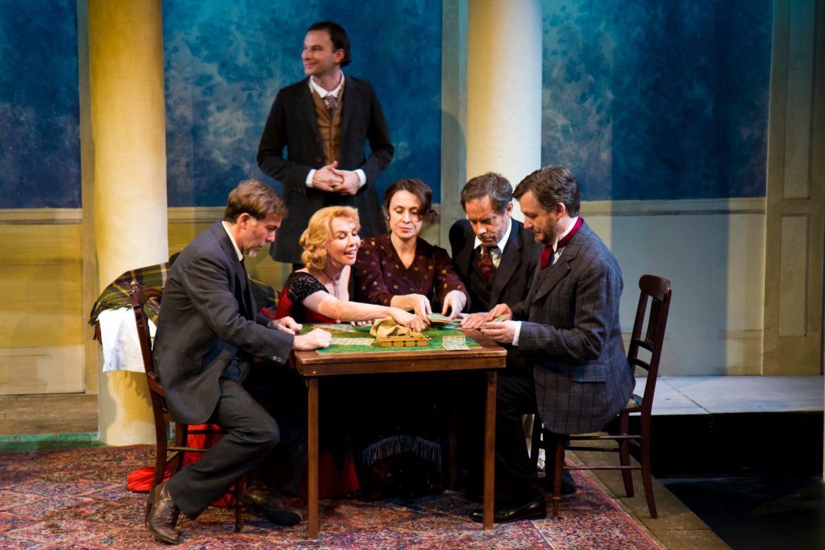 (L–R) Cousin Gregory (Tim Ruddy), Isobel (Trudie Styler), Pauline (Stella Feehily), Dr. Hickey (Rufus Collins), and Mr. Aston (Alan Cox), with James (Ryan David O’Byrne) in back, appear in Thomas Kilroy’s adaptation of “The Seagull.” (Prabhakar Jeff Street)
