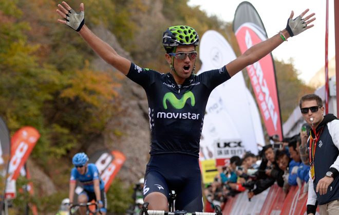 Movistar’s Beñat Intxausti raises his arms in triumph as he crosses the finish line to win Stage Four of the 2013 Tour of Beijing. (tourofbeijing.com)