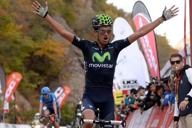 Movistar’s Beñat Intxausti raises his arms in triumph as he crosses the finish line to win Stage Four of the 2013 Tour of Beijing. (tourofbeijing.com)