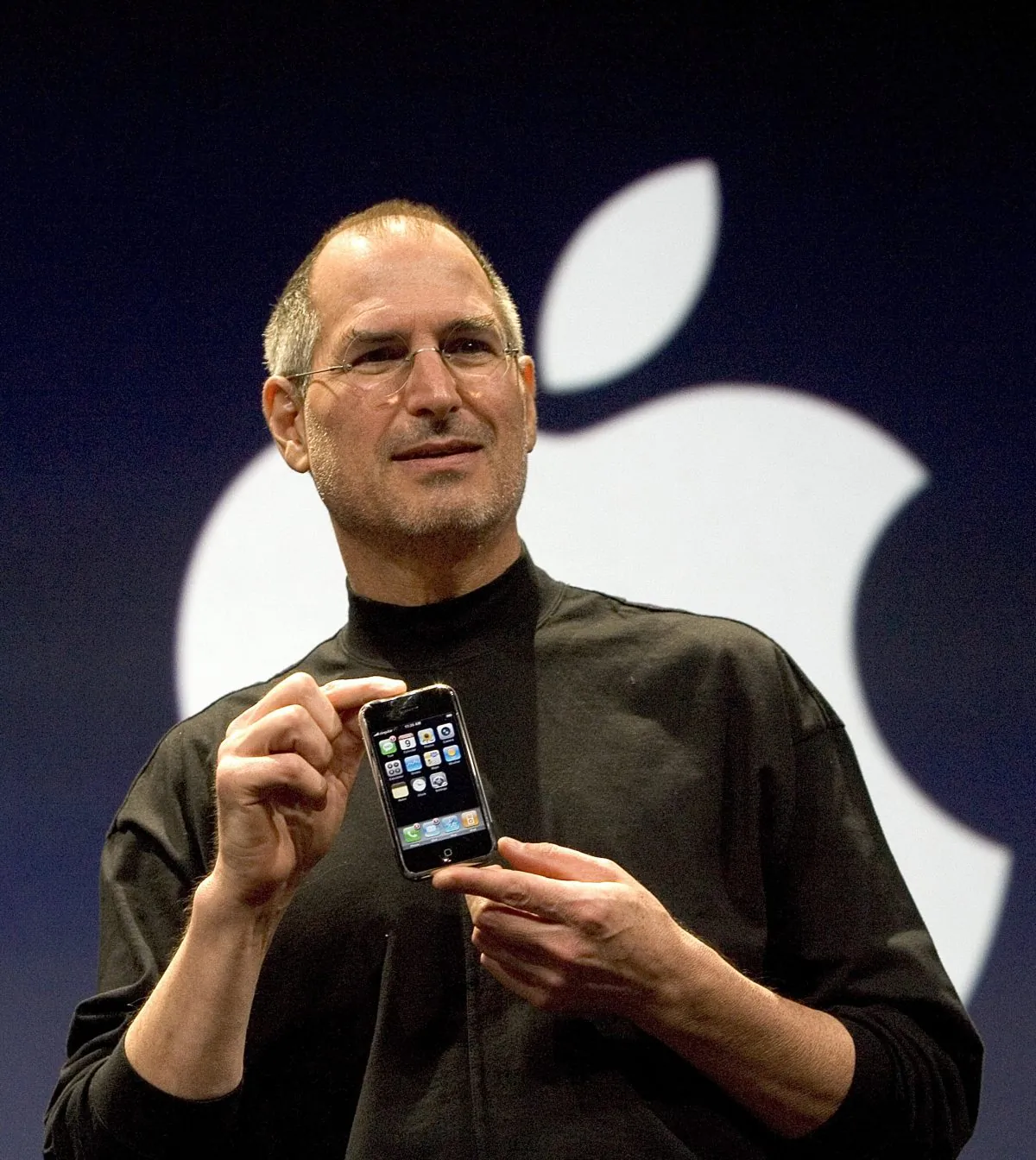 Steve Jobs announcing the first iPhone—an began a new era of smartphones. October 5 marked two years since the former Apple CEO’s death. (David Paul Morris/Getty Images)