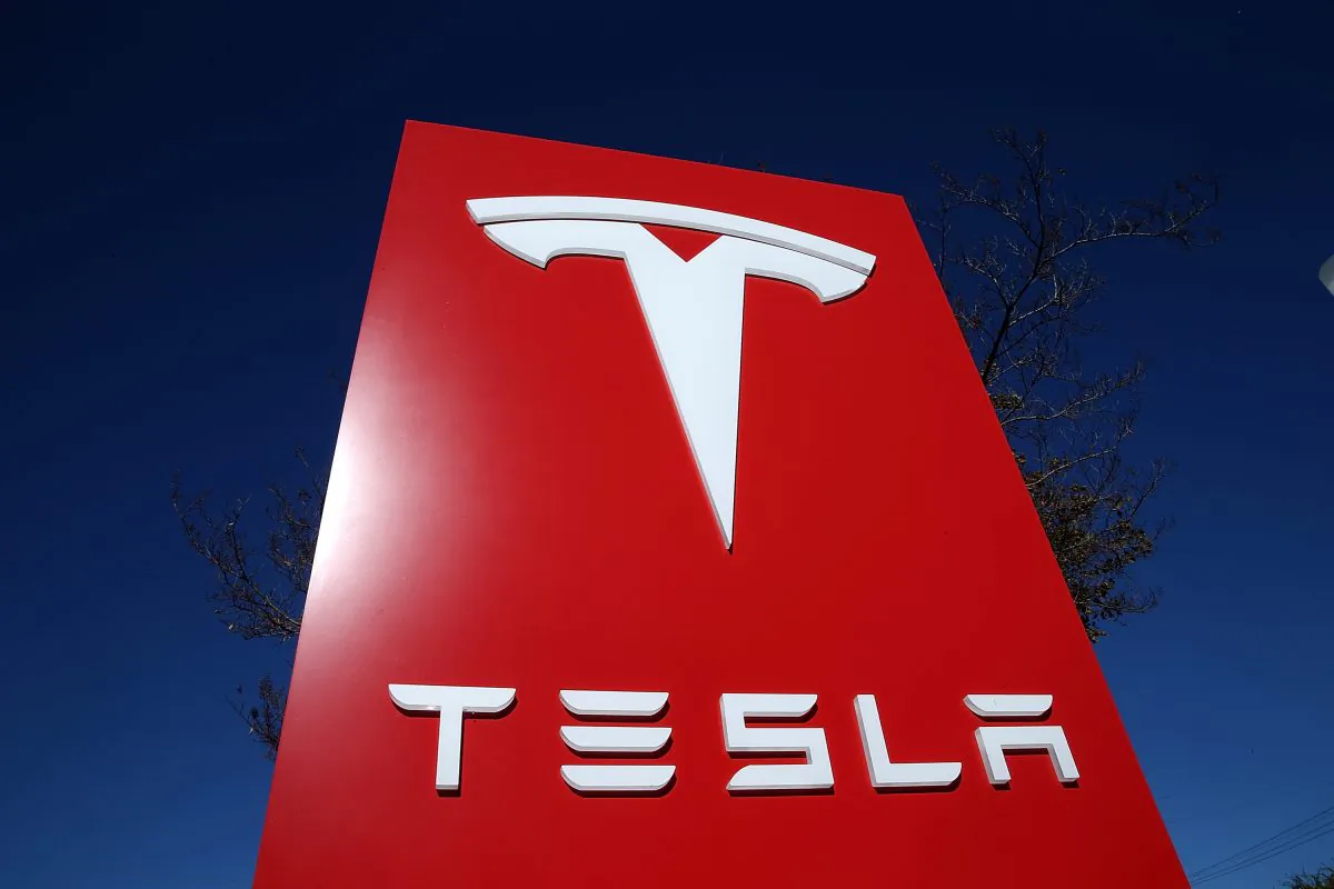 A Tesla sign in a Palo Alto, Calif. showroom, Nov. 5. (Justin Sullivan/Getty Images)