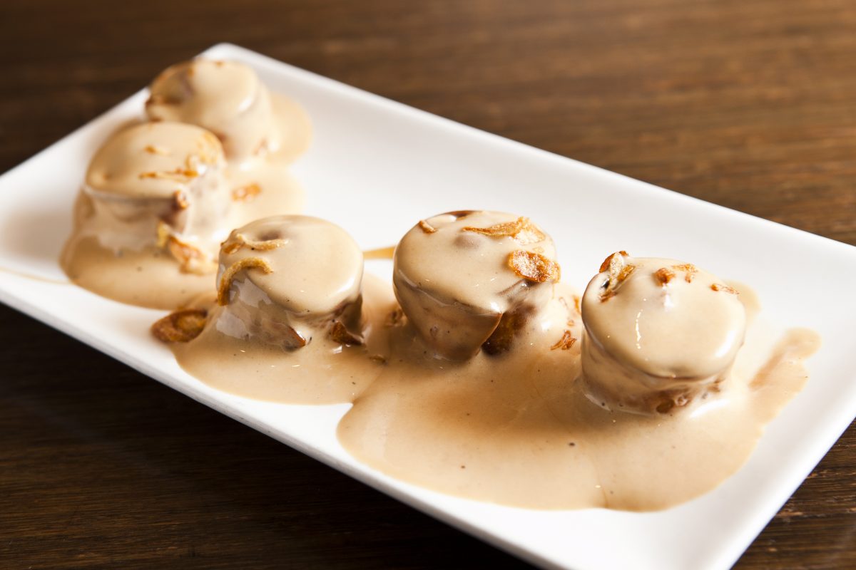 Short Rib Dumplings, with braised short rib, and caramelized onions enrobed in a sweet soy-truffle emulsion. (Samira Bouaou/Epoch Times)