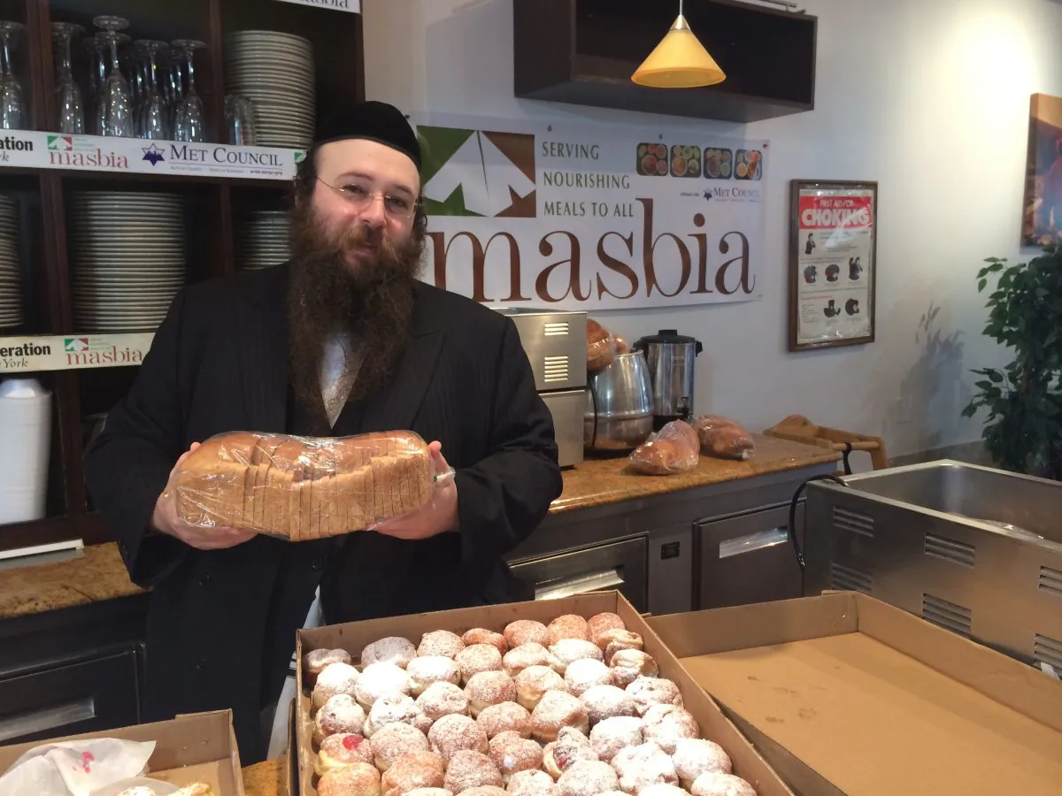 NYC food kitchen Masbia is serving triple as many people as three months ago, largely a result of federal cuts to SNAP.