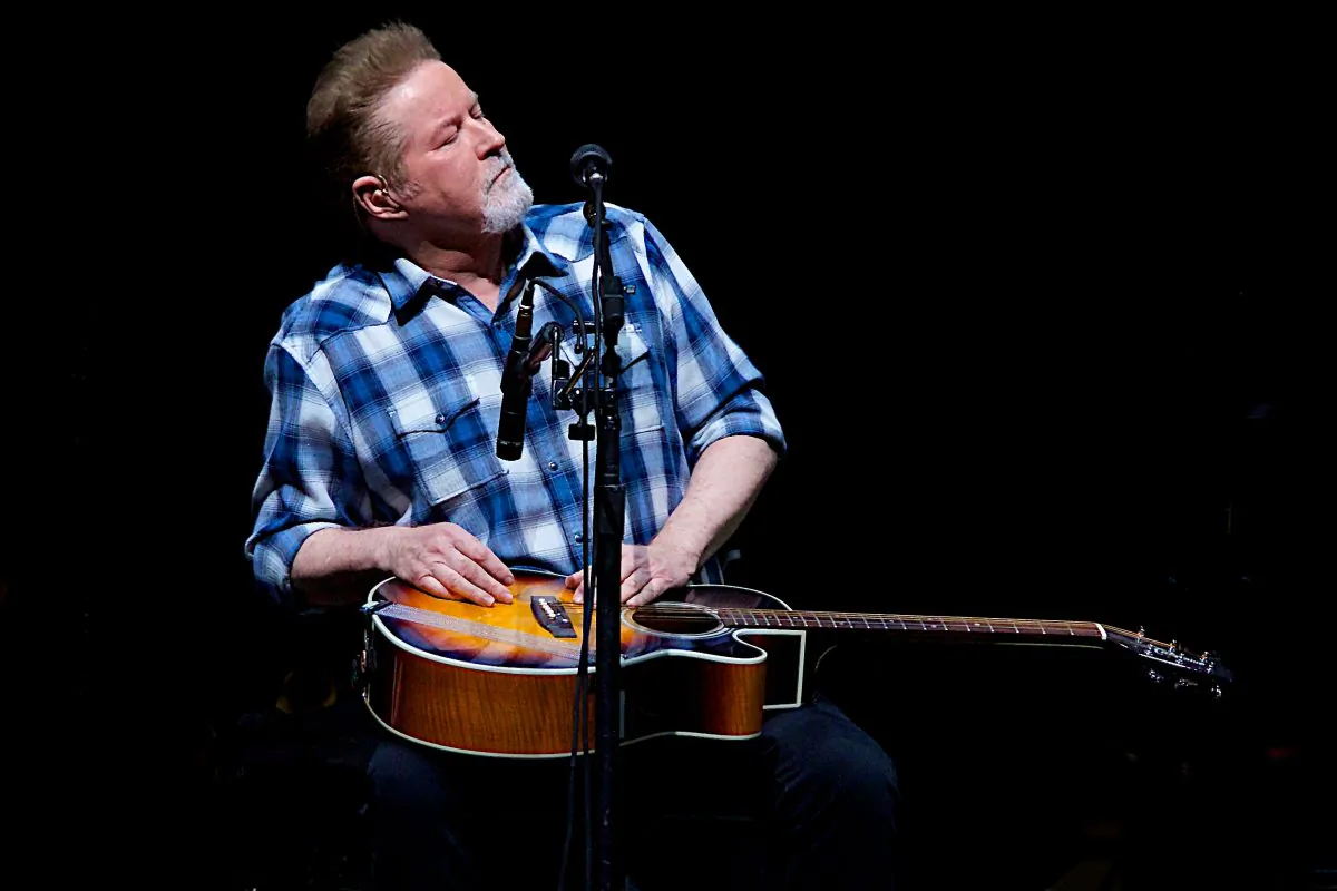 Henley gets into the groove as he lays down the beat on his acoustic guitar. (DQC Photo)