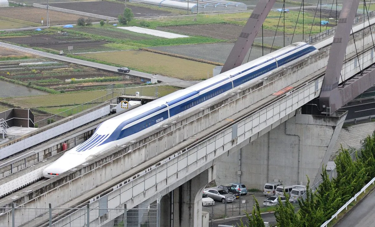 The Maglev (magnetic levitation) train speeds through during a test run on the experimental track in Tsuru, west of Tokyo, on May 11, 2010. The US transport chief was on the test ride on Japan's super-fast magnetic train, a contender for President Barack Obama's multi-billion-dollar national railway project.(Toru Yamanaka/AFP/Getty Images) 