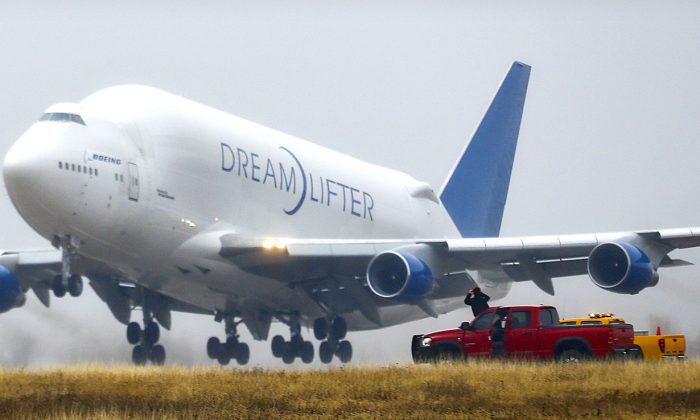 A Boeing 747 Dreamlifter takes off Nov. 21, 2013, the day after it mistakenly landed at Col. James Jabara Airport in Wichita, Kan. (AP Photo/The Wichita Eagle, Fernando Salazar)