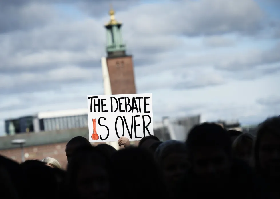 Protesters gather outside the United Nations Intergovernmental Panel on Climate Change (IPCC) in Sweden on Sept. 27, 2013. (Johnathan Nackstrand/AFP/Getty Images)