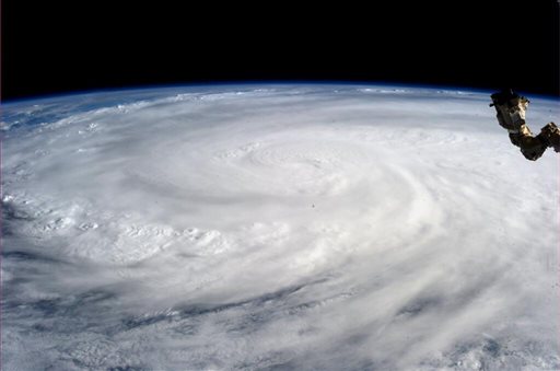 This image provided by NASA shows Typhoon Haiyan taken by Astronaut Karen L. Nyberg aboard the International Space Station Saturday Nov. 9, 2013. (AP Photo/NASA, Karen L. Nyberg)