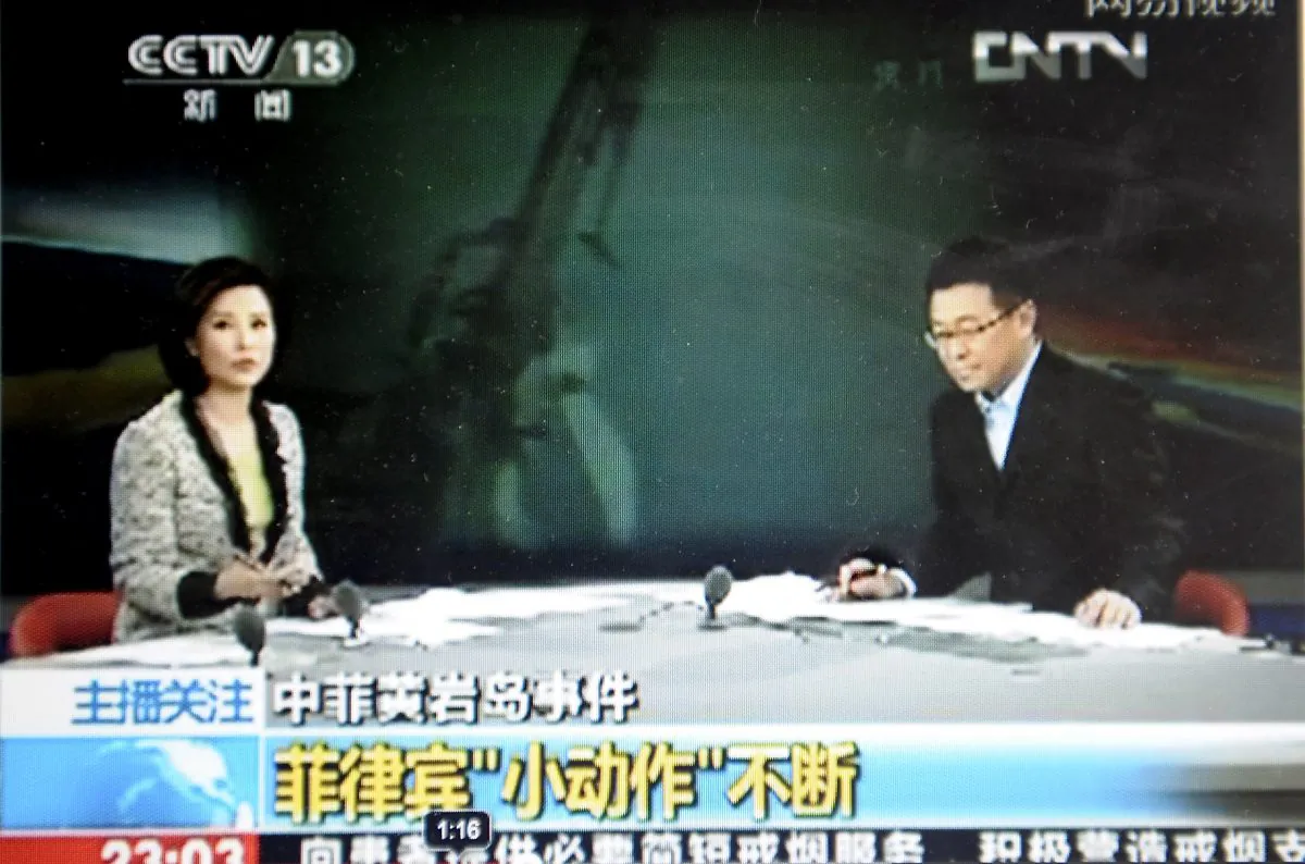 This file photo shows a screen grab from CCTV taken on May 7, 2012. A Chinese blogger points out that the differences between CCTV and Western media are worth a laugh, and some serious thought. (CCTV/AFP/Getty Images) 