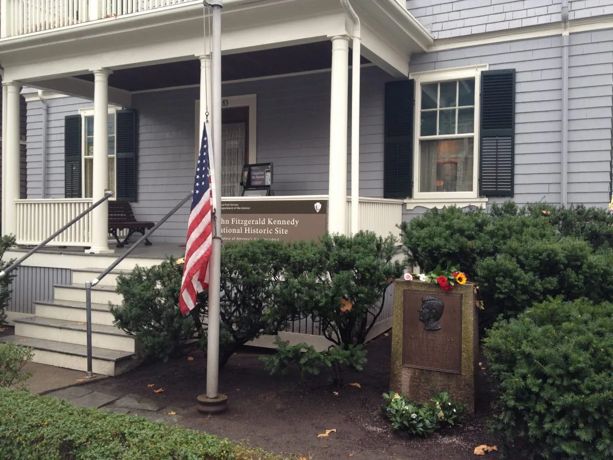 A marker in the front yard was placed by the Town of Brookline in 1960 to honor the towns “most eminent son.”  The John Fitzgerald Kennedy National Historic Site is located in Brookline, Mass. Nov. 22, 2013.  (Phoebe Ryles/The Epoch Times)