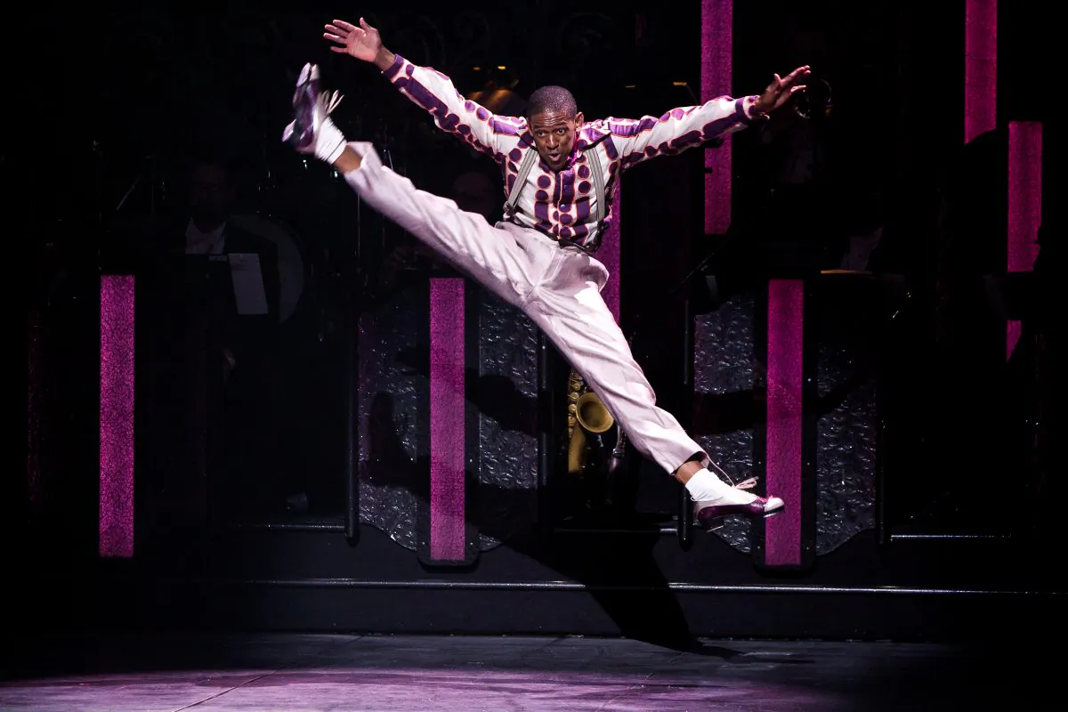 Jared Grimes defying gravity in "After Midnight." (Matthew Murphy)