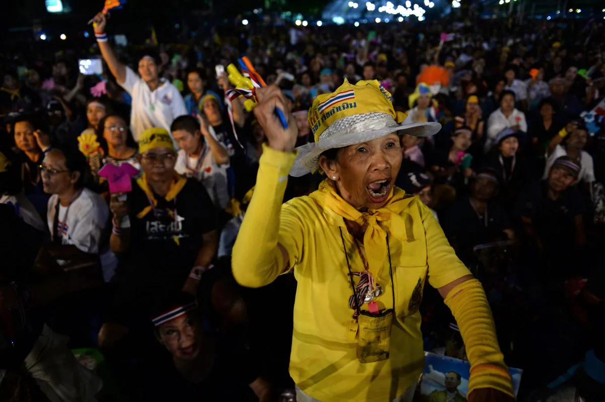 A Thai opposition protester shoutS slogans during a rally at Democracy Monument in Bangkok on Nov. 11, 2013. Thailand's Senate on November 11 debated then defeated a highly contentious political amnesty bill as thousands of anti-government protesters massed in Bangkok to try to heap pressure on Prime Minister Yingluck Shinawatra. (Christophe Archambault/AFP/Getty Images)