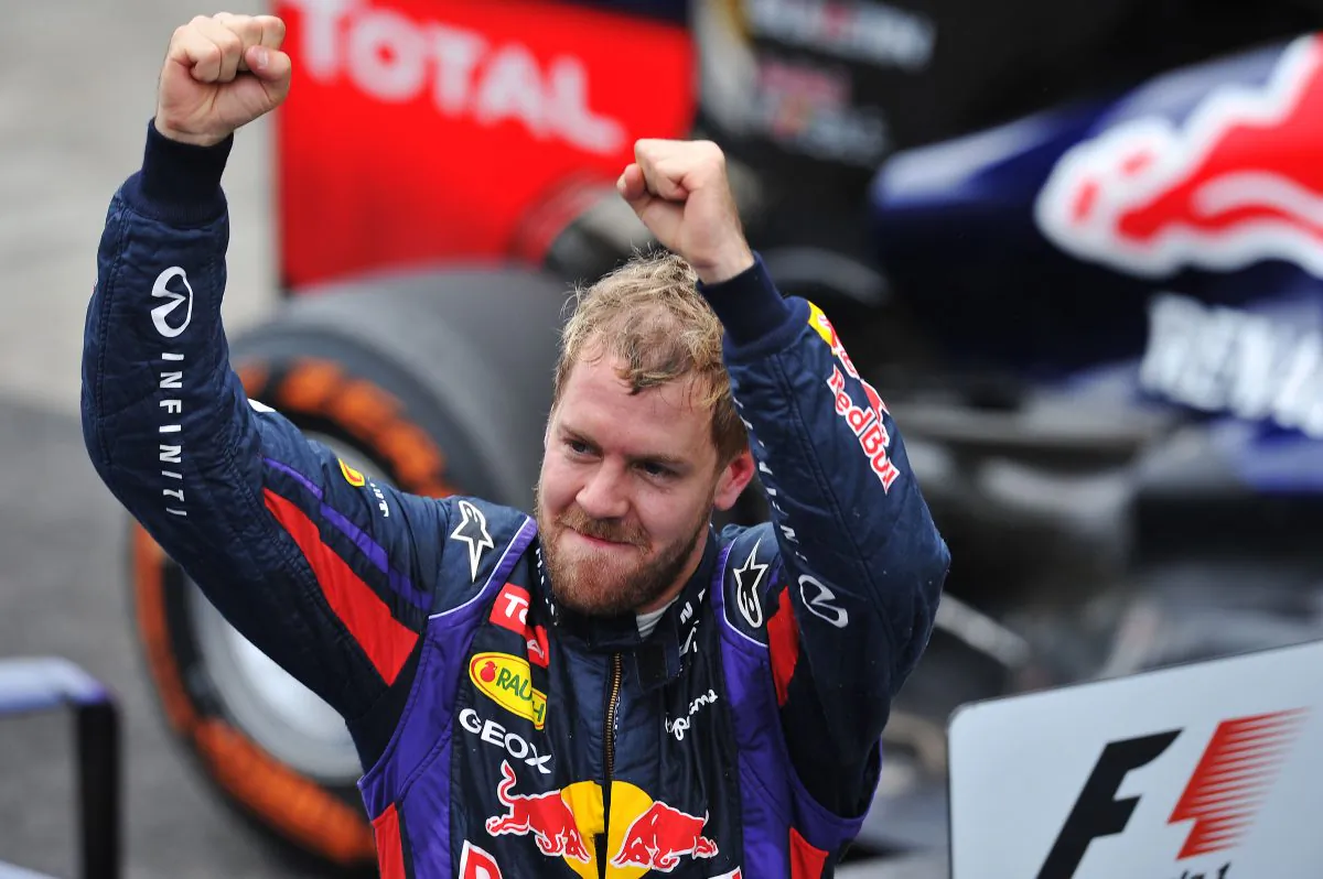 Sebastian Vettel of Red Bull racing celebrates his victory in the Formula One Brazilian Grand Prix on November 24, 2013 at the Interlagos racetrack in Sao Paulo, Brazil. (Nelson Almeida/AFP/Getty Images)